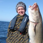 super Wetter, toller Fisch, glücklicher Angler in Norwegen