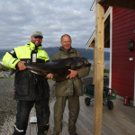 Duo mit Fisch in Nordnorwegen